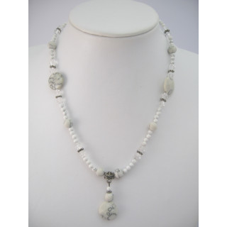 Howliet white with small amulet