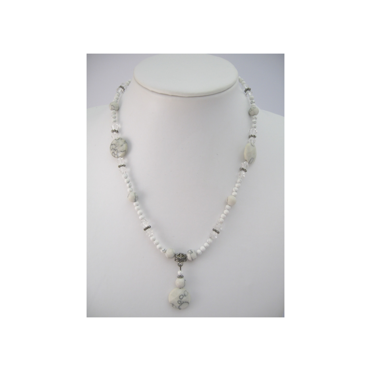 Howliet white with small amulet