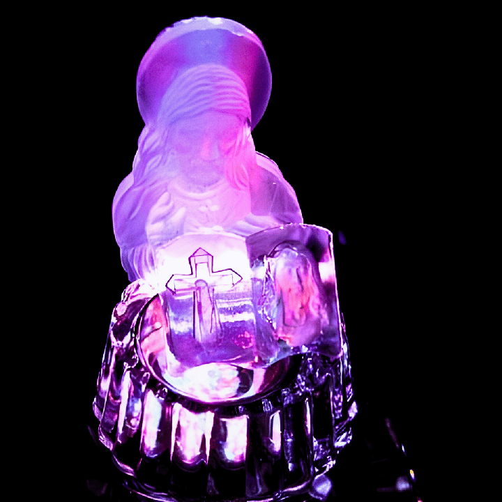 Crystal statue Jesus with bible